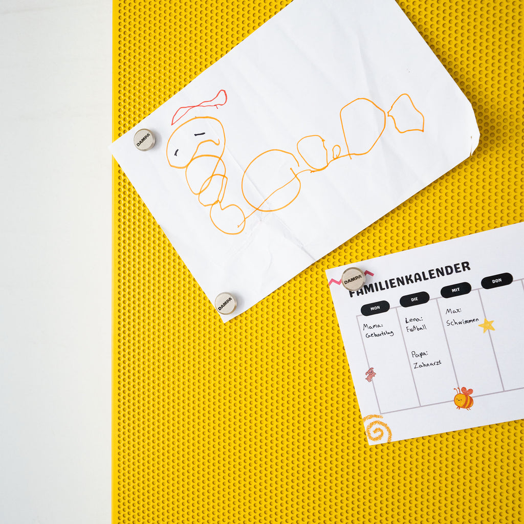 DAMPA Silent Board - Silent Board Flex in yellow with family calender and drawing 